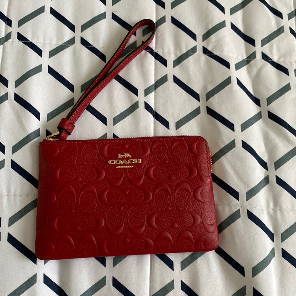 Coach pouch ! Can fit your daily items ,